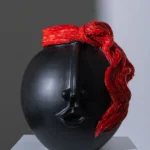 Black and Red Head Vase