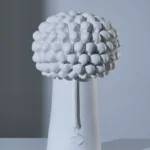 La scatola PIGNA IN BIANCO 
PINE IN WHITE ORNAMENTAL CERAMIC VASE