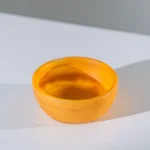 HUCOS, Orange Transparant Swirl Resin, Round Serving Bowl, 4"D x
1.5"H MSq